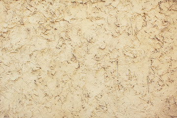 Old yellow or orange wall, background.