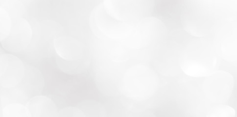 A brilliant blurry white background for a festive mood. Template for greeting card for entertainment.