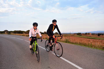 Fototapeta premium cycling couple on a road