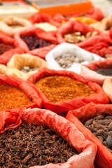 Spices for sale at the market in Xinjie, China.