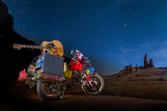 Motorcycle on rock climbing route, Canyonlands National Park, Moab, Utah, USA