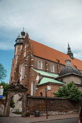 Churches in Poland. Ancient houses in European cities. Church.