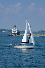 Long Beach Bar Light is a lighthouse off Orient, New York. It was originally a screwpile lighthouse that was later converted to concrete caisson foundation. 