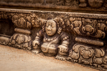 Bahirawa stone carving in intricate detail at sacred site in Anuradhapura, Sri Lanka
