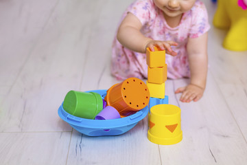 Baby Girl Playing with Colorful Educational Toy