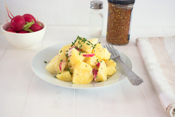 Delicious potato salad with radish and yogurt dressing