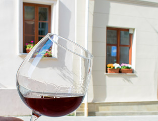 A glass of wine in a cafe.