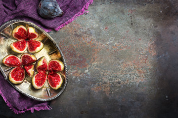 Fototapeta na wymiar Harvest fall autumn concept. Ripe juicy violet figs