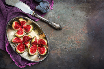 Harvest fall autumn concept. Ripe juicy violet figs