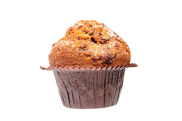 muffin with chips of chocolate and powdered sugar, isolated on white background