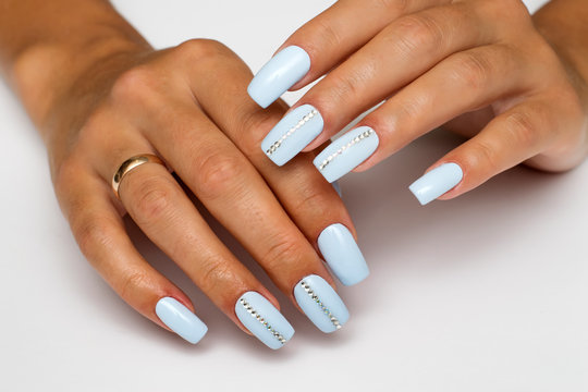 summer blue, heavenly nails with crystals on long square nails
