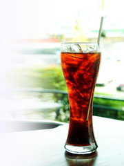 Cola in glass with cool ice for stop hungery eagerly