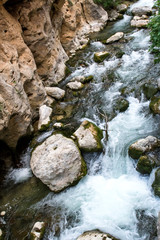 Fototapeta na wymiar Rapid flowing water in the river.