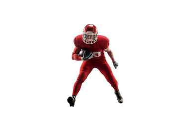Active one american football player isolated on white background. Fit caucasian man in uniform jumping over studio background in jump or motion. Human emotions and facial expressions concept