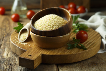 Dry couscous grains in the bowl