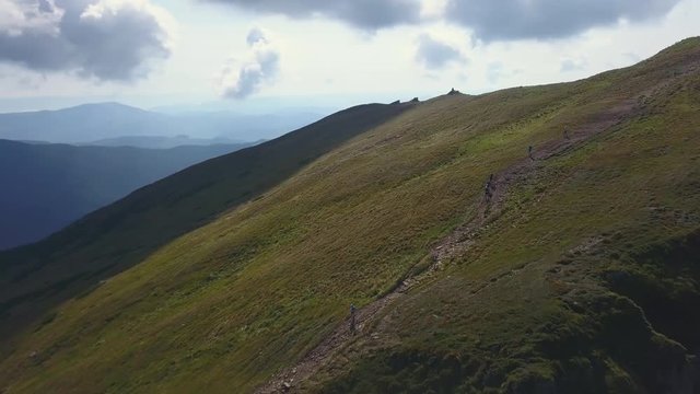 Runners descend from the Pop Ivan mount in the Carpathians drone footage