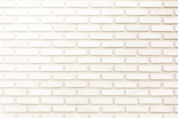 Cream and white brick wall texture background. Brickwork or stonework flooring interior rock old pattern clean concrete grid uneven bricks design stack.