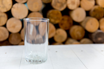 Glass of pure water on a white kitchen table
