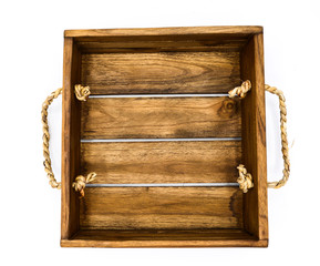 Empty retro dark brown wooden box with rope on white background