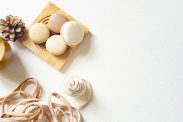 Cookie cakes, coffee and spruce cone and tangle