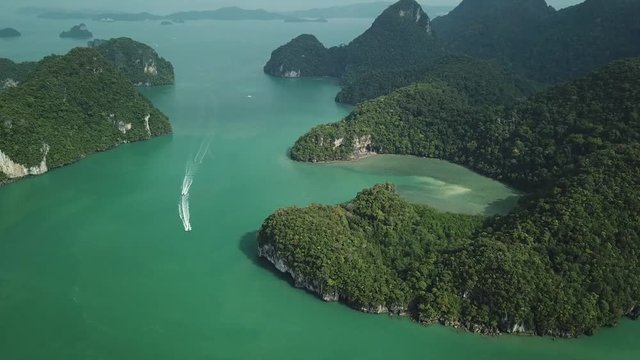 Bird&rsquo;s eye view Nature landscape Dayang Bunting Island Lake Pregnant Maiden. Guillemard Rain forest Rocks Sea Green water Boats sail great speed. Langkawi Malaysia Travel Landmark Day sunny. Aerial