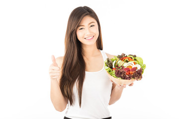 Beautiful Attractive Asian woman smile and holding fresh mix vegetables salad with healthy skin feeling so happiness,Isolated on white background,Health Care concept