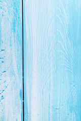 Fototapeta na wymiar background of wooden boards of blue color with the effect of wear