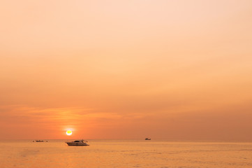 Phuket golden sky sunset with silhouette boat