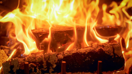 Closeup image of burning wood in fireplace