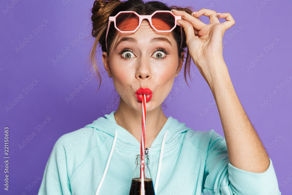 Poster Portrait of a funny young girl with bright makeup