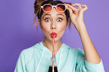 Portrait of a funny young girl with bright makeup