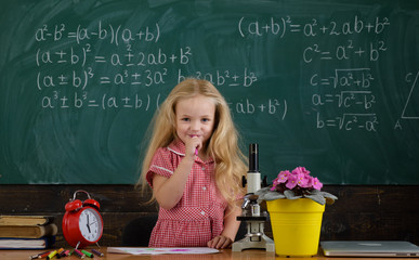 Cute girl study in school classroom, knowledge concept. Confident in her knowledge