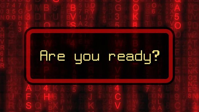 The text Are you ready?, appearing on a board over random symbols falling down (code rain, a popular sci-fi movie effect), changing their color from green to red.
