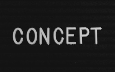 Word concept written on the letter board. White letters on the black background