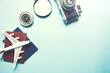 Camera with airplane and passport