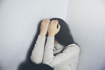 Depressed and sad young woman