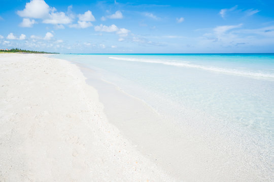 wonderful beach of Varadero during a sunny day, fine white sand and turquoise and blue Caribbean sea,sky with clouds,Cuba.