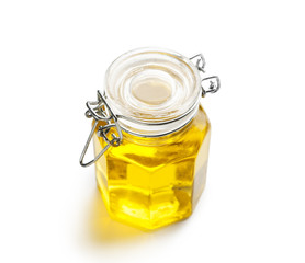 Fresh sweet honey in jar, isolated on white