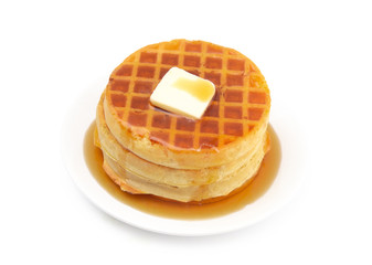 Round Waffles Ready for Breakfast on a White Background