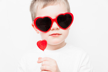 Boy with Heart Sunglasses and Lollipop