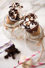 Two cornetto ice cream. Vanilla ice cream on wafle on white background