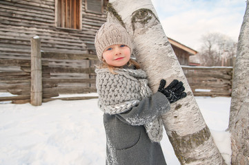 Girl and Tree in Winter