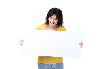 Young woman holding blank board on white background