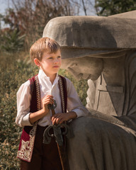 Boy with Statue