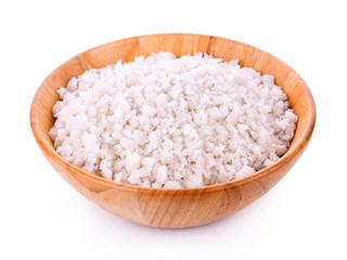 Sea salt in wooden bowl on white background