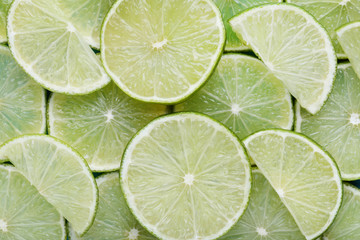 Pieces of lime fruit background