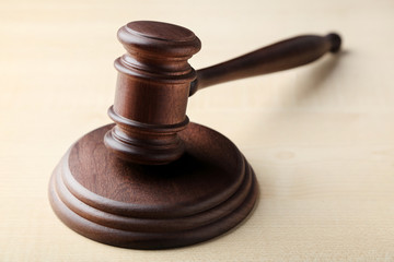 Judge gavel on wooden table