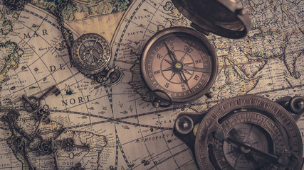 Fototapeta na wymiar Old Compass On World Map