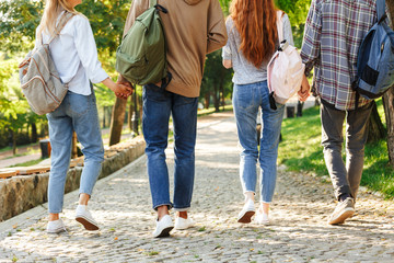 Back view cropped image group of students