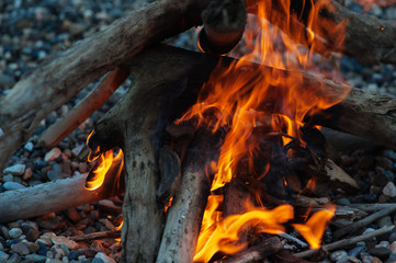 On small stones, a fire from a firewood burns beautifully!